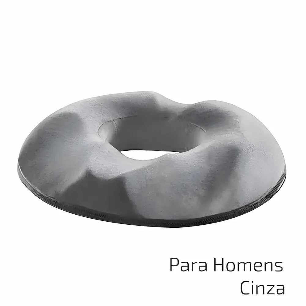 Para Homens Cinza: Almofada cinza em formato de donut, recomendada para homens. Tem uma cavidade central que ajuda a aliviar a pressão em longos períodos sentado. Esta é uma das opções de compra.