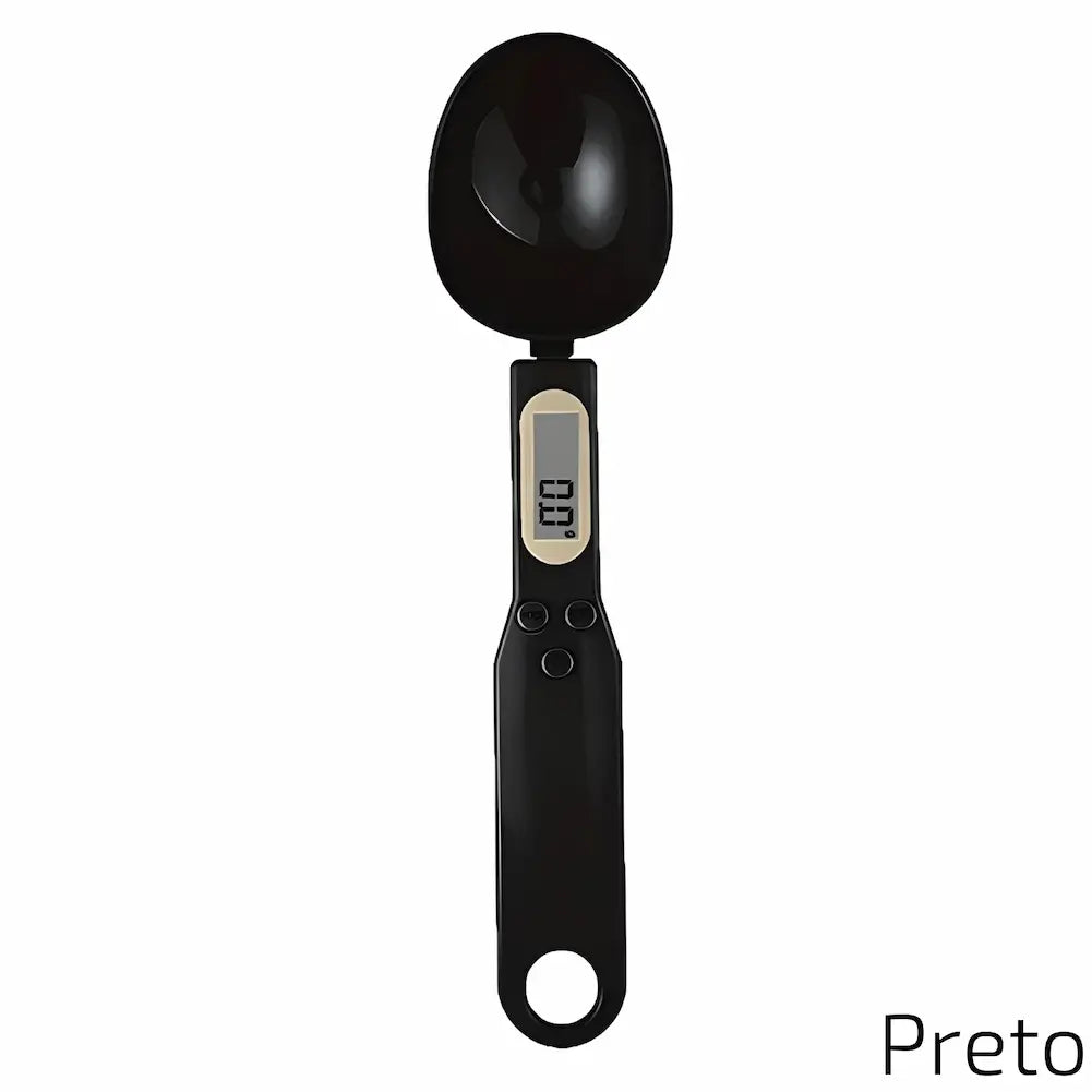 Balança digital de precisão em formato de colher, na cor preta. Possui um visor digital com detalhes em amarelo e três botões de controle (MODE, TARE, HOLD) abaixo do visor. A colher é ideal para medições precisas de ingredientes.