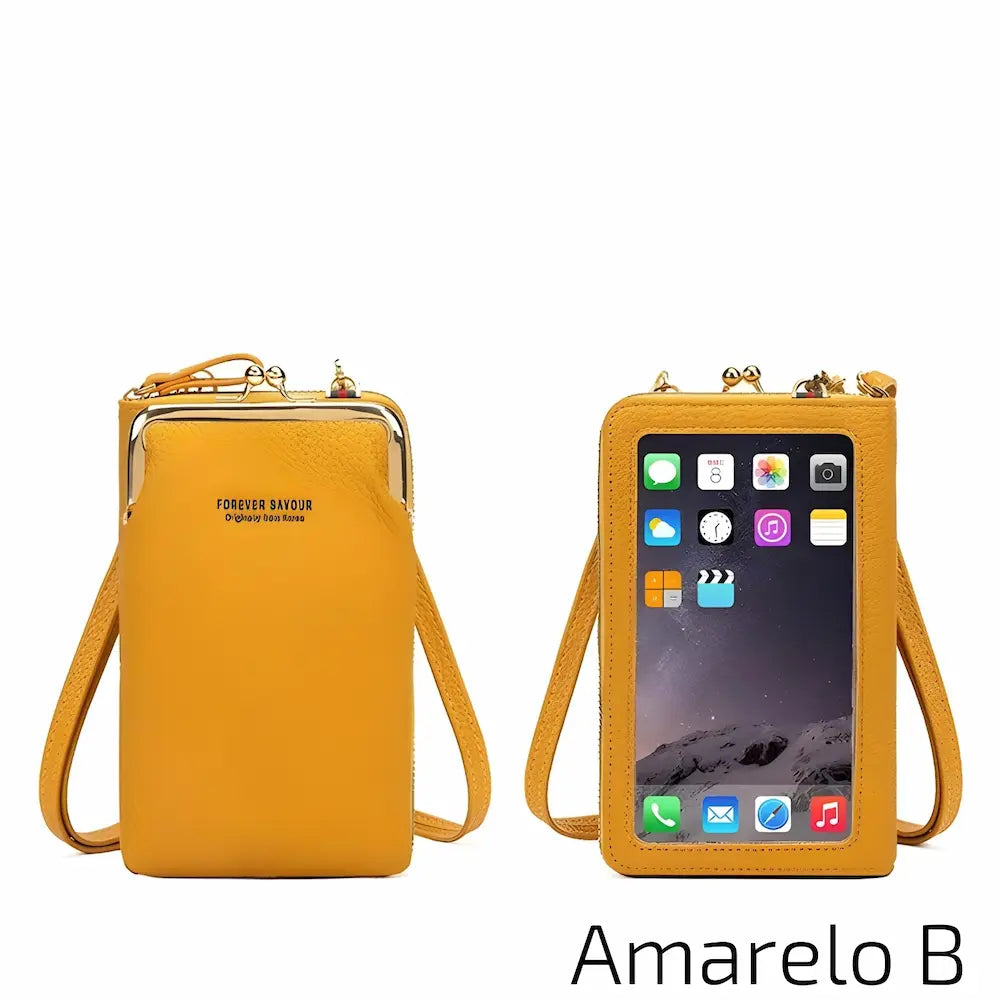 Uma bolsa de couro amarela com alça ajustável. Possui um design moderno com um fecho metálico no topo e uma janela transparente na frente para acesso rápido ao celular. No canto inferior direito, o código "Amarelo B", uma das opções de compra.