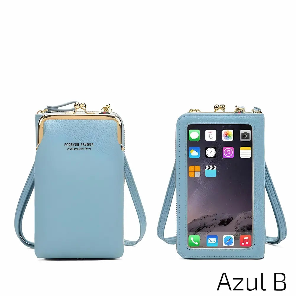 Bolsa de couro azul clara com alça ajustável. Inclui uma janela transparente na frente para facilitar o uso do celular e um fecho metálico no topo. No canto inferior direito, o código "Azul B", uma das opções de compra.