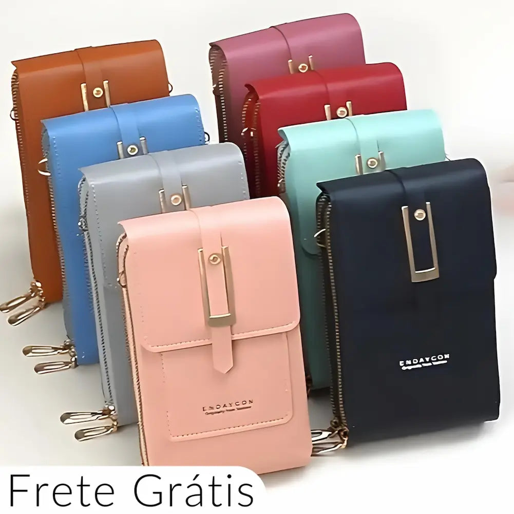  A imagem mostra várias bolsas tiracolo femininas da marca Endaycon em diferentes cores: rosa, azul, cinza, preto, vermelho, marrom e verde. As bolsas possuem fechos metálicos dourados e zíperes laterais. No canto inferior esquerdo, há um texto "Frete Grátis" em destaque. As bolsas estão dispostas em duas fileiras.