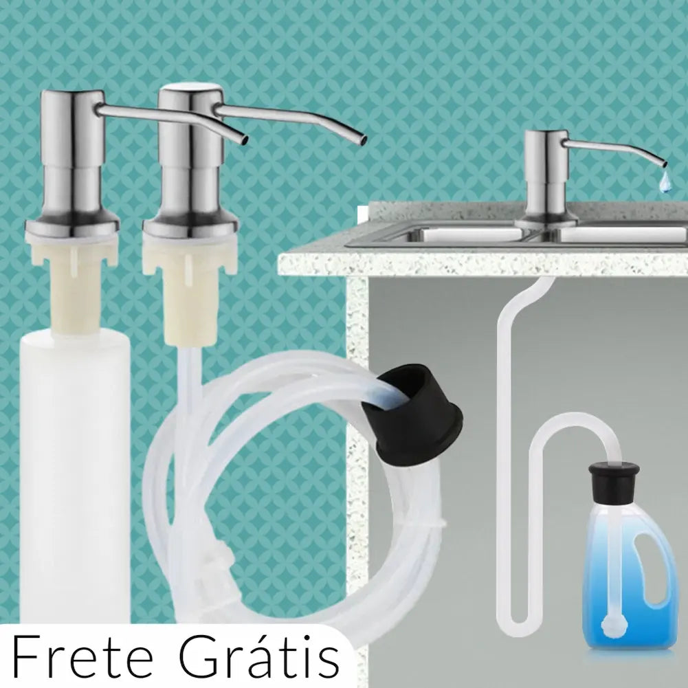 A imagem mostra dois dispensers de sabão prateados, um com um frasco branco e outro com tubos transparentes conectados. Ao fundo, uma pia de cozinha com um dispenser instalado. Abaixo da pia, um tubo conecta o dispenser a um frasco de sabão azul. O texto "Frete Grátis" está no canto inferior esquerdo sobre um fundo branco.