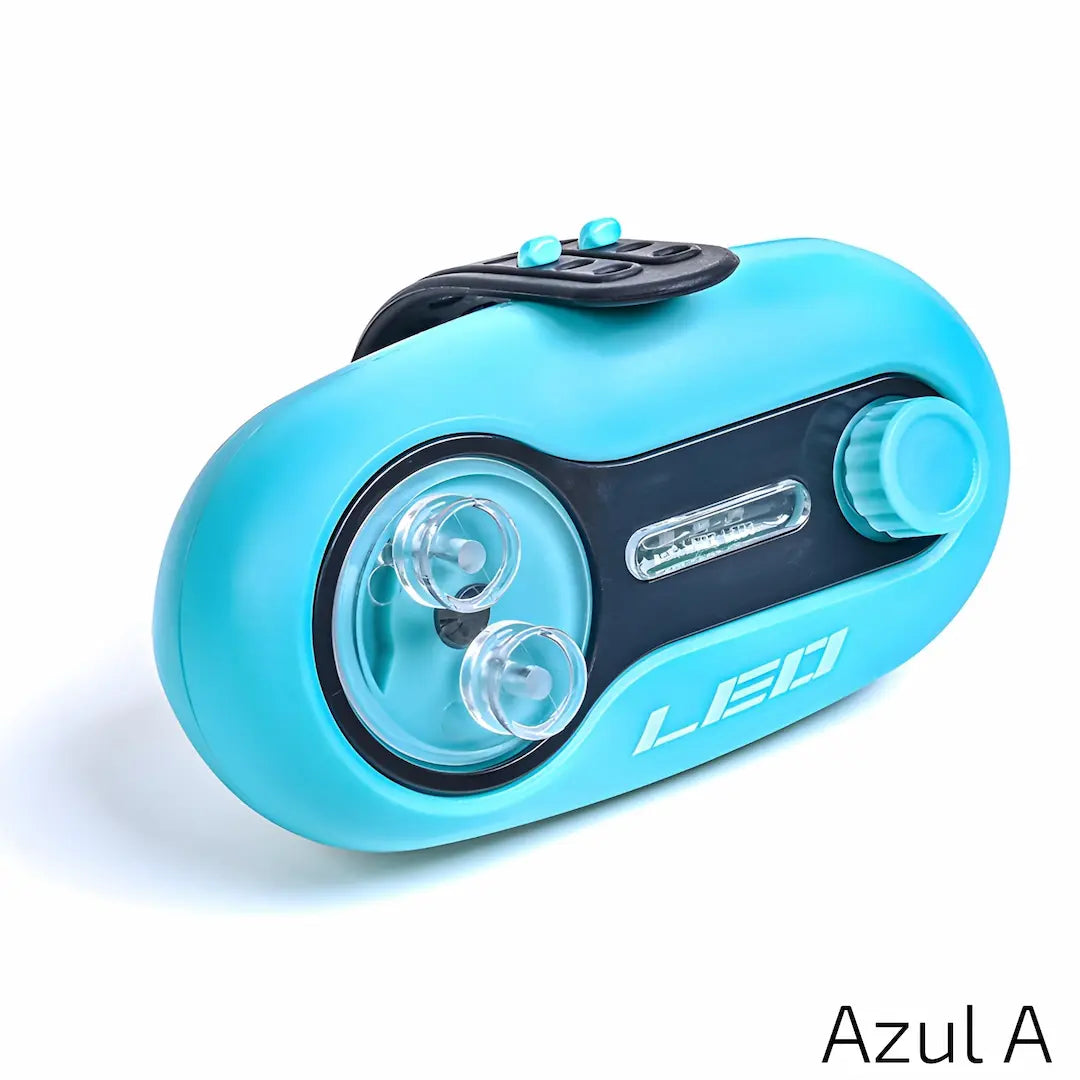A imagem mostra o dispositivo em uma versão azul vibrante, com a palavra "LED" em destaque. Ele possui as mesmas características da versão preta, com duas lâmpadas de LED visíveis e um botão de ajuste. A alavanca também está posicionada na parte frontal, indicando que esta é a versão "Azul A".
