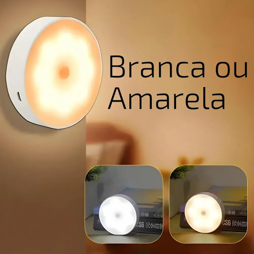  Imagem de uma luminária redonda na parede emitindo uma luz amarela. Abaixo, duas pequenas imagens mostram a luminária em duas cores diferentes: branca e amarela. O texto ao lado diz "Branca ou Amarela".