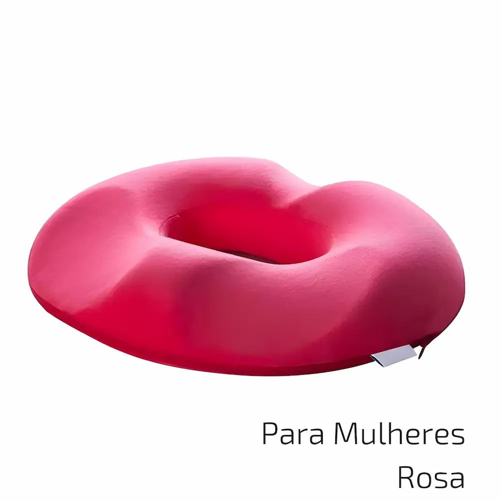 Para Mulheres Rosa: Almofada rosa vibrante em formato de donut, indicada para mulheres. Apresenta uma cavidade central para maior conforto e alívio de pressão. Esta é uma das 