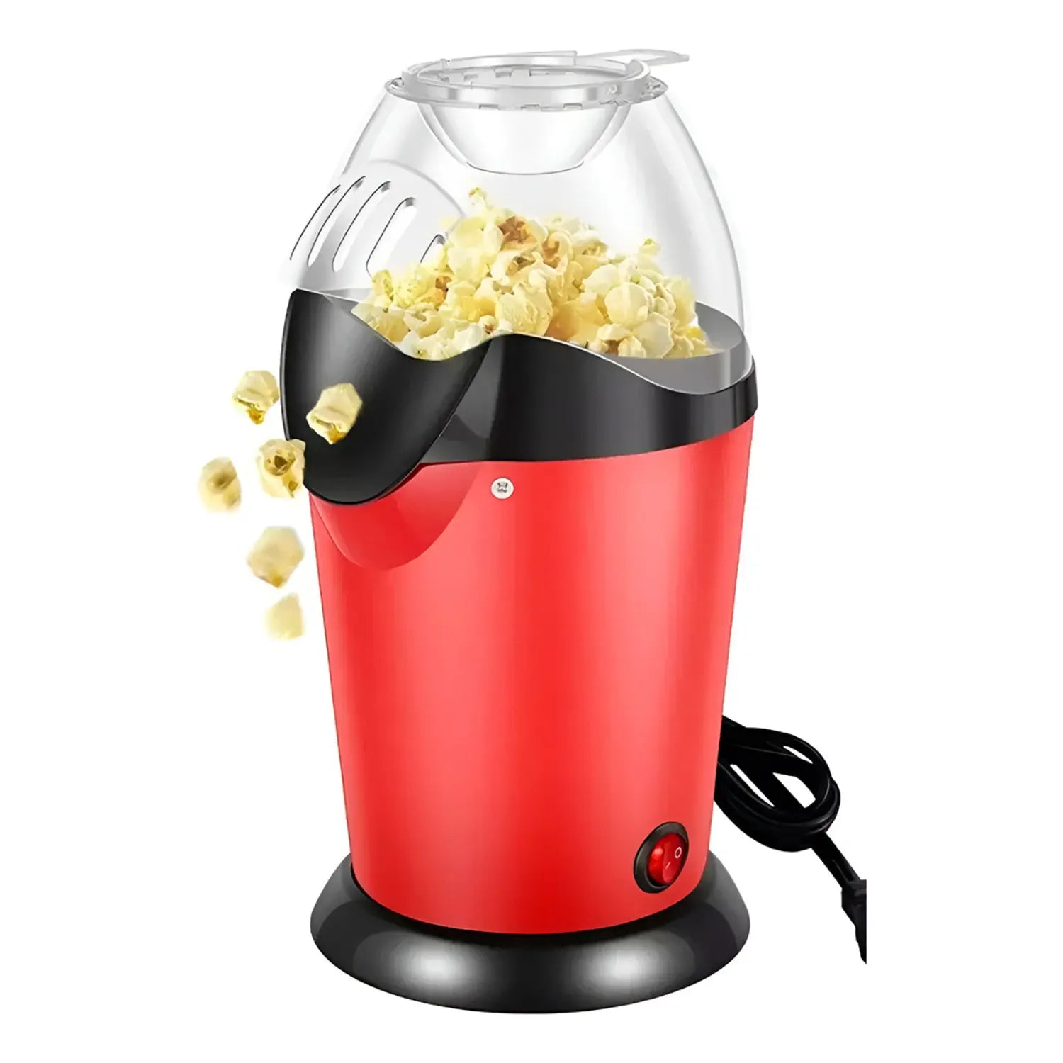 A imagem mostra uma pipoqueira vermelha em funcionamento, com pipocas sendo despejadas para fora do recipiente. A máquina possui uma tampa transparente, que permite ver as pipocas estourando dentro. O design é moderno, com uma base preta e um botão de ligar/desligar visível na parte inferior. O cabo de energia também está visível ao lado da pipoqueira.