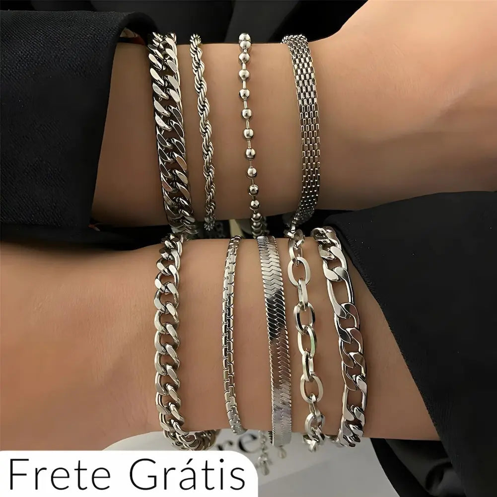  Imagem de dois pulsos exibindo várias pulseiras de aço inoxidável de diferentes estilos. As pulseiras incluem elos cubanos, correntes de bolinhas, malhas finas e correntes entrelaçadas, todas com acabamento polido e elegante. O texto "Frete Grátis" está visível na parte inferior da imagem.