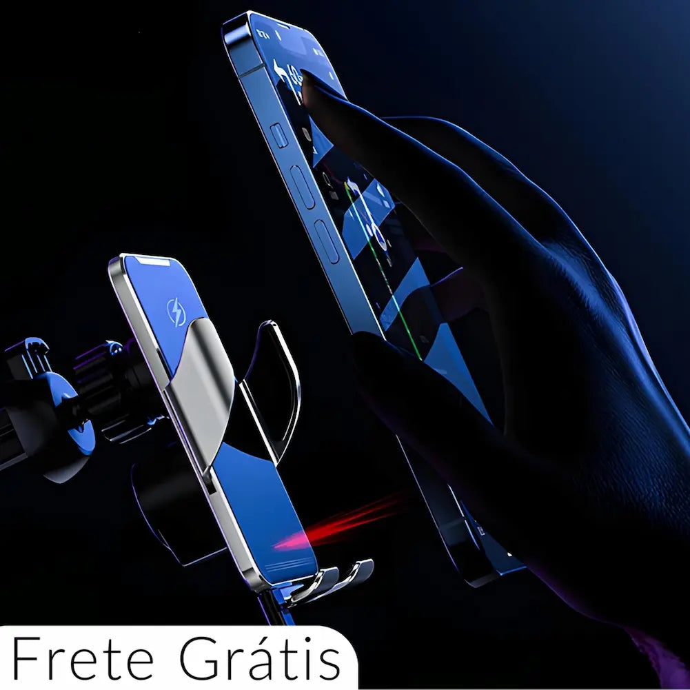 Imagem de fundo escuro com texto branco no canto inferior esquerdo: "Frete Grátis". Mostra uma mão segurando um celular próximo a um suporte de carregamento sem fio, fixado na ventilação do carro. O celular está prestes a ser encaixado no suporte, com uma linha vermelha indicando detecção infravermelha.